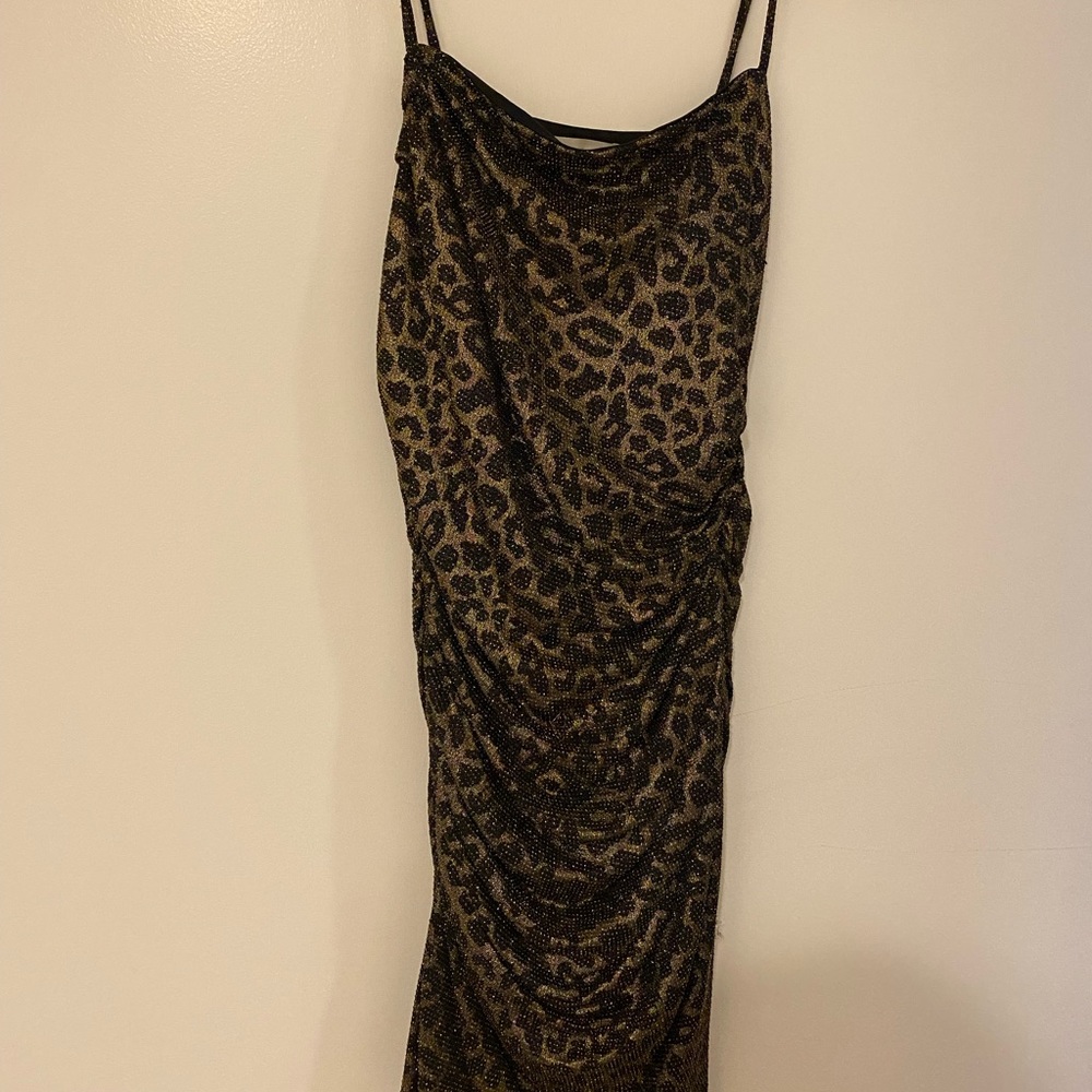 Fun sparkly cheetah dress! It is stretchy and comfortable. Only worn once.